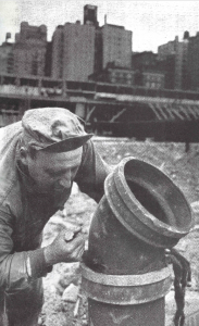 1960's photo of NYC plumber using nupak oakum
